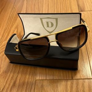 Dita men’s glasses. They are Mach One titanium